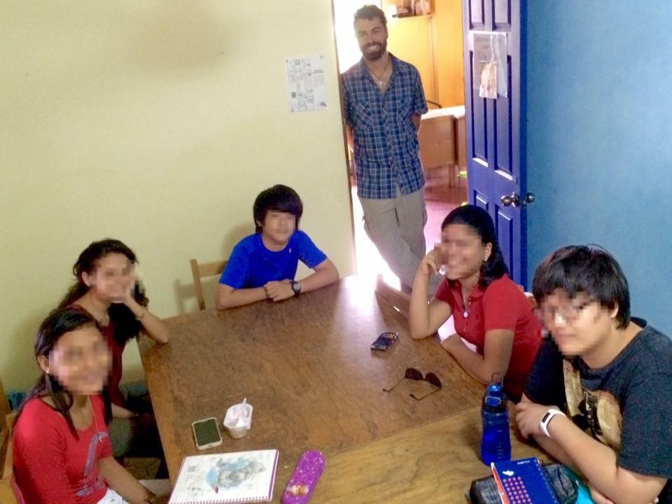John teaching English abroad